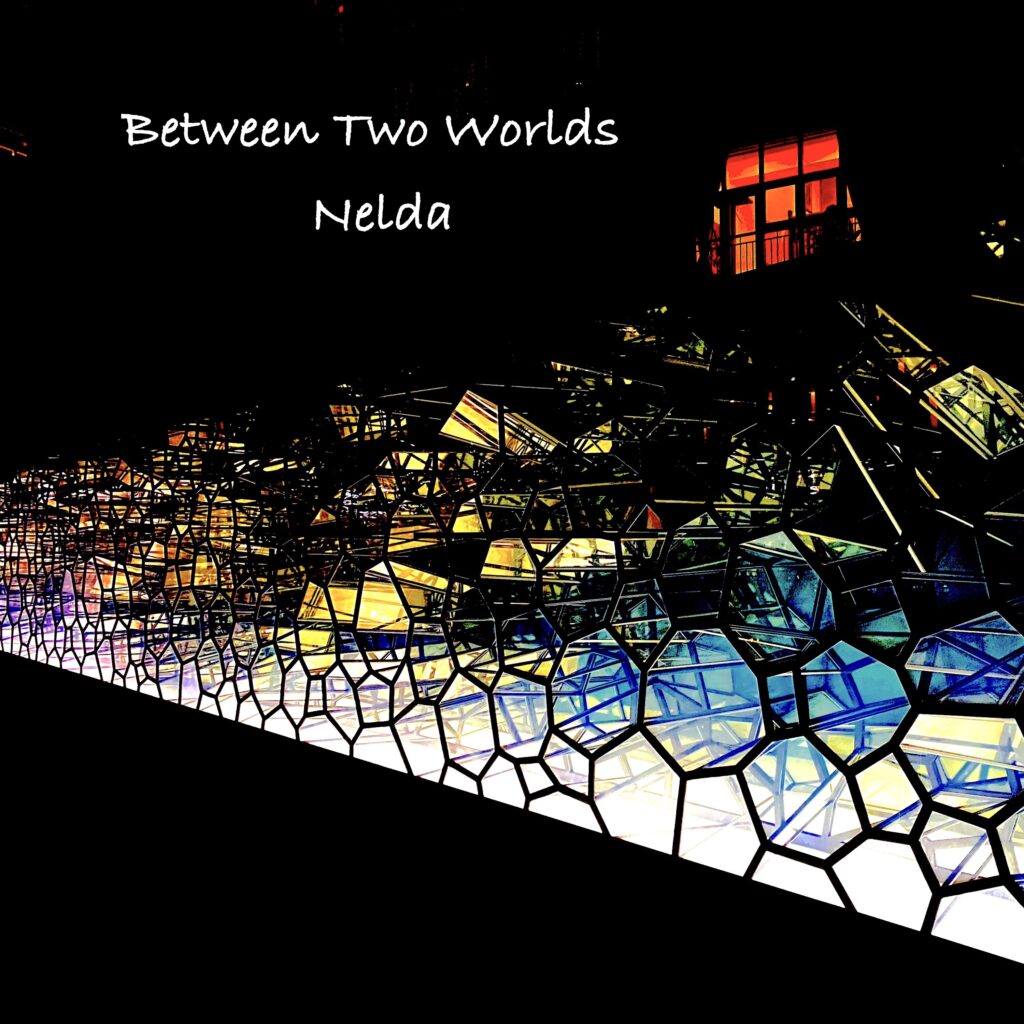 Nelda – “Between Two Worlds”