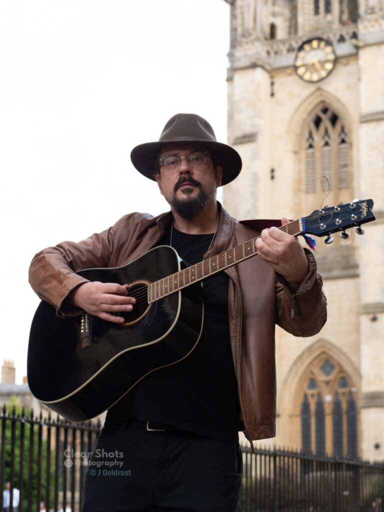 John Goldrust – “Travellers In Timing”